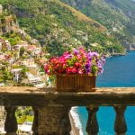 Balcony view of Positano cascading down to the sea