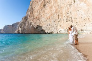 Couple on a beach honeymoon on the Italian coast