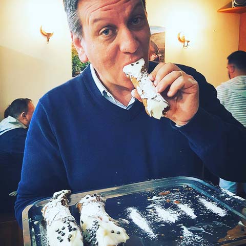 Italy_Sicily_Food_Tommaso_Eating_Giant_Cannolo_GL01