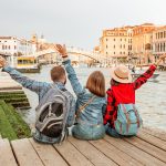 Group of Tourists at Venice canal