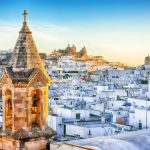 white town Ostuni and cathedral at sunrise