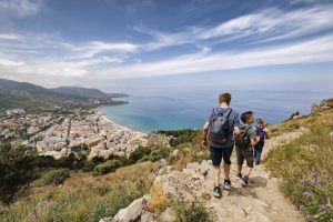 Family excursion on the Tyrrhenian Sea near Cefalu, Sicily, Italy