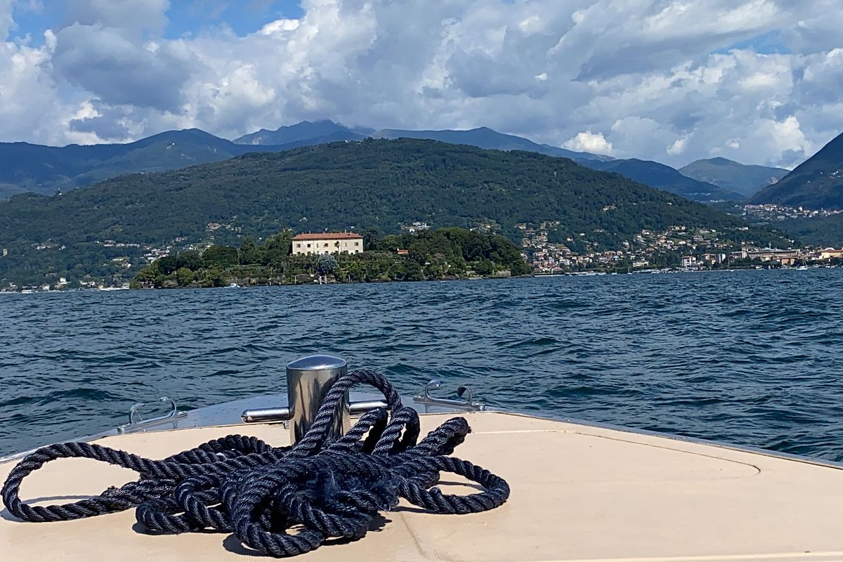 Boat approaching the Borromean Islands on Lake Maggiore, Piedmont, Italy