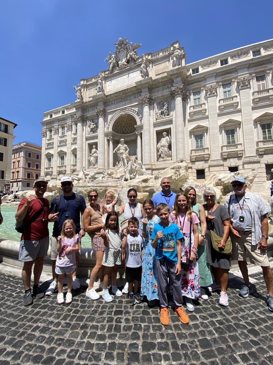 Multi-generational family at Trevi Fountain, Rome
